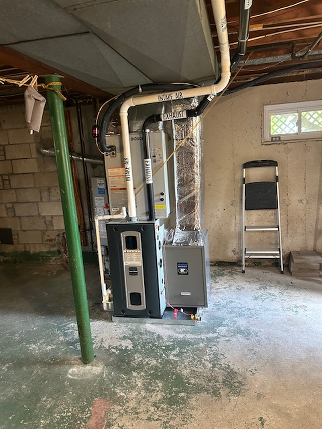 Professional furnace installation in basement