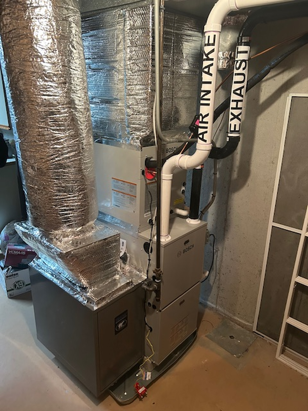 Bosch furnace installation with insulated ductwork by Fong & Sullivan