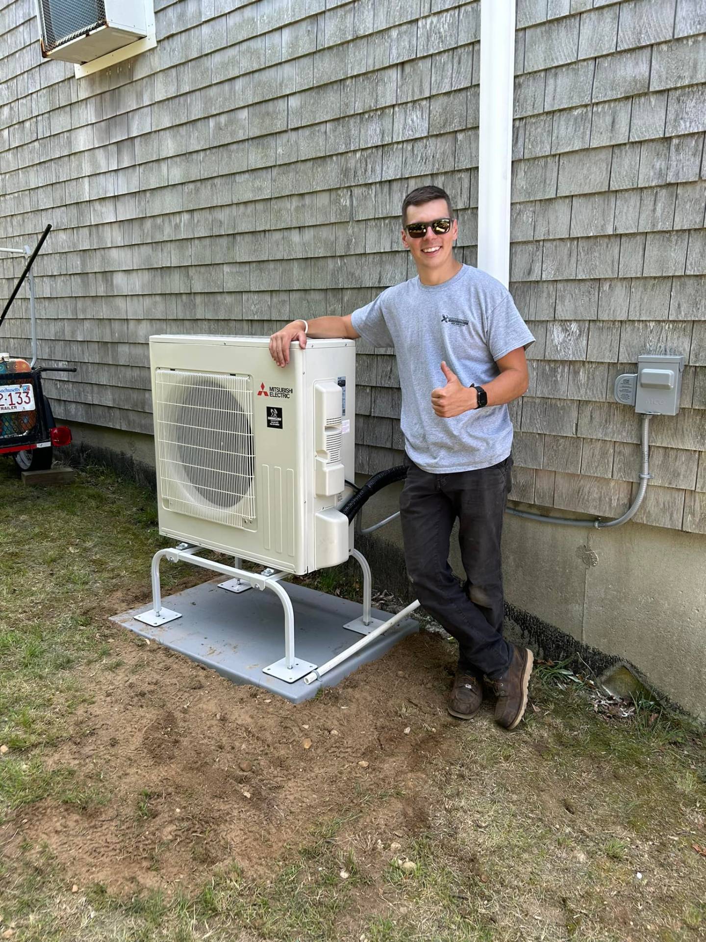 Fong & Sullivan owner with professional Mitsubishi HVAC installation