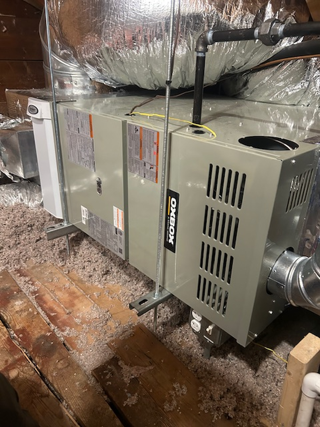 Oxbox attic HVAC installation with ductwork by Fong & Sullivan